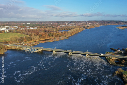 Geesthacht bei Hamburg. Elbbrücke der bundesstraße B404 mit Staustufe und Fischtreppe, Luftaufnahme photo