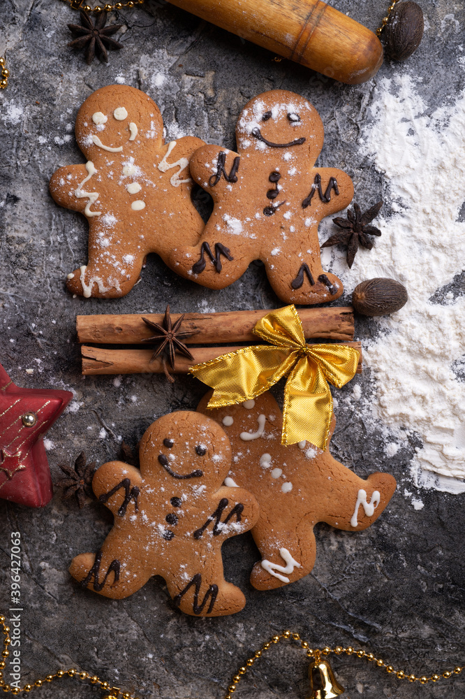  christmas decorative cookies   around grey background. flat lay.  christmas background concept