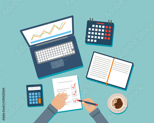 Cartoon Flat Style Top View Vector Illustration On Blue Background. Desktop With Different Office Items. Hands Of Businessman Writing On Paper, Calculator, Calendar, Planner, Coffee And Laptop Near