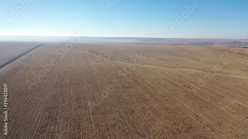 Aerial view of dry farmland that has already been cut and harvested