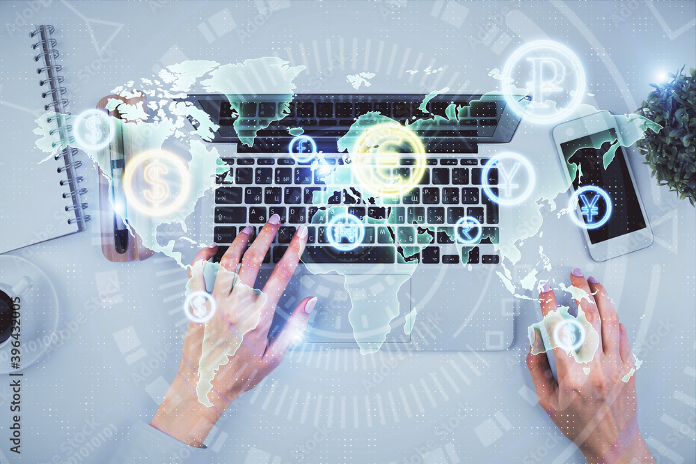 Double exposure of woman hands working on computer and forex chart hologram drawing. Top View. Financial analysis concept. Double exposure of woman hands working on computer and forex chart hologram drawing. Top View. Financial analysis concept.