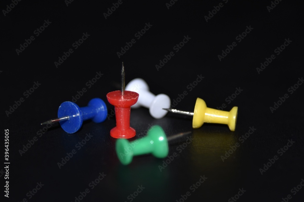 push pin isolated on black push pin isolated on black