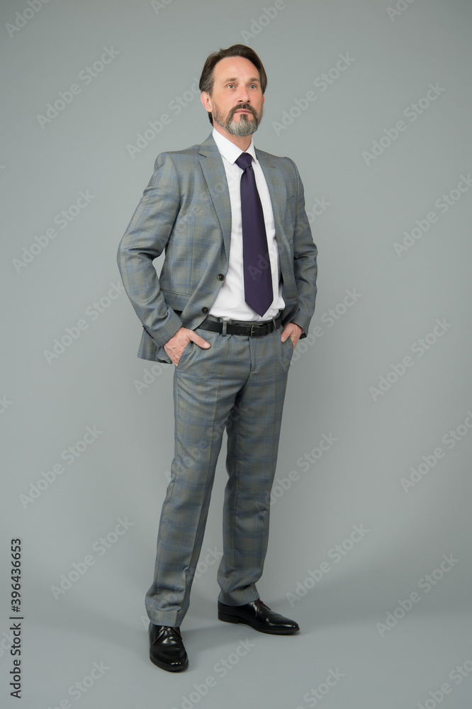 Advance. fashion look wardrobe of ceo male. business attire. exclusive menswear store. modern office life. bearded mature man in formalwear. businessman or manager with beard and mustache Advance. fashion look wardrobe of ceo male. business attire. exclusive menswear store. modern office life. bearded mature man in formalwear. businessman or manager with beard and mustache