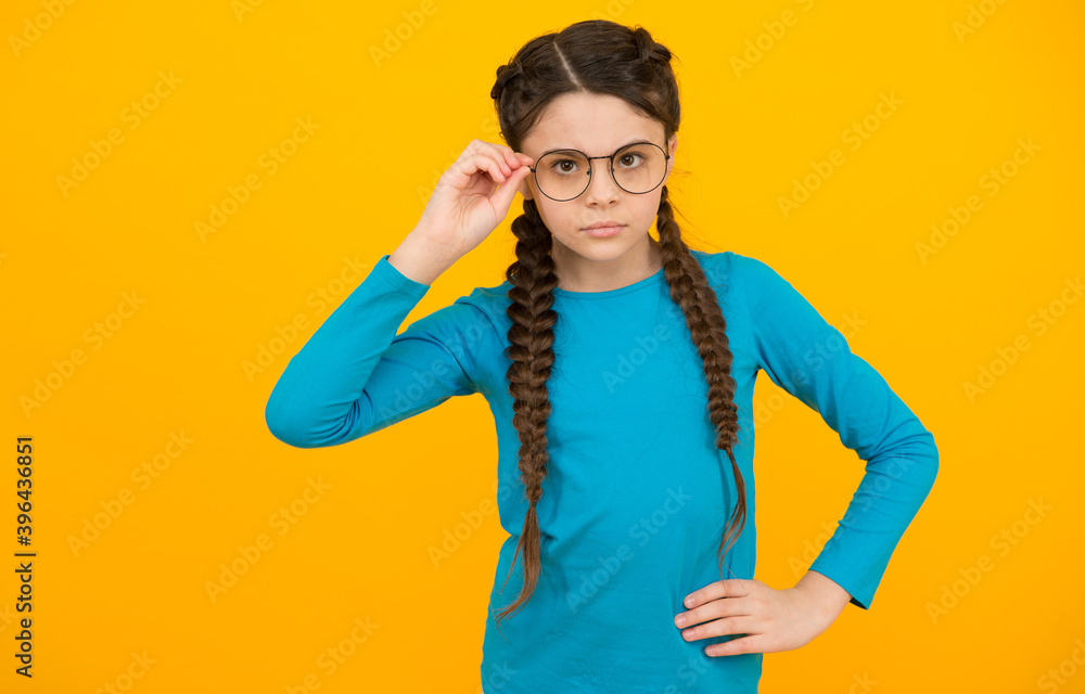 what make student smart. childhood. back to school. vision concept. teenage girl in eyeglasses. kid with braided hair. at optometrist. eyesight correction. hairdresser salon for child what make student smart. childhood. back to school. vision concept. teenage girl in eyeglasses. kid with braided hair. at optometrist. eyesight correction. hairdresser salon for child