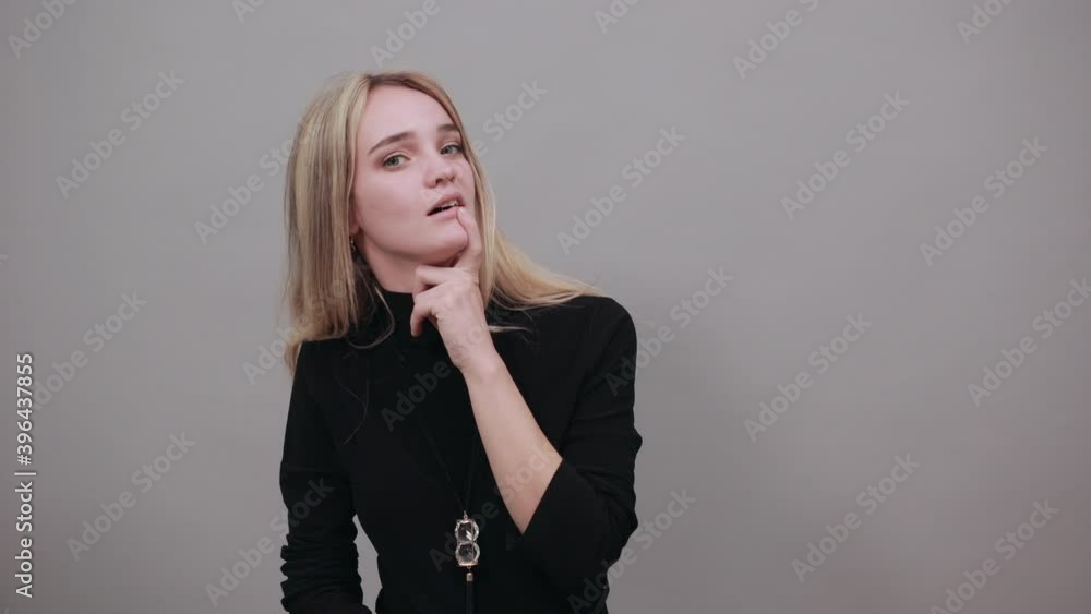 Hand on chin thinking about question, pensive expression. Doubt. Thoughtful face. Using that incredibly sharp business mind. Hand on chin thinking about question, pensive expression. Doubt. Thoughtful face. Using that incredibly sharp business mind.
