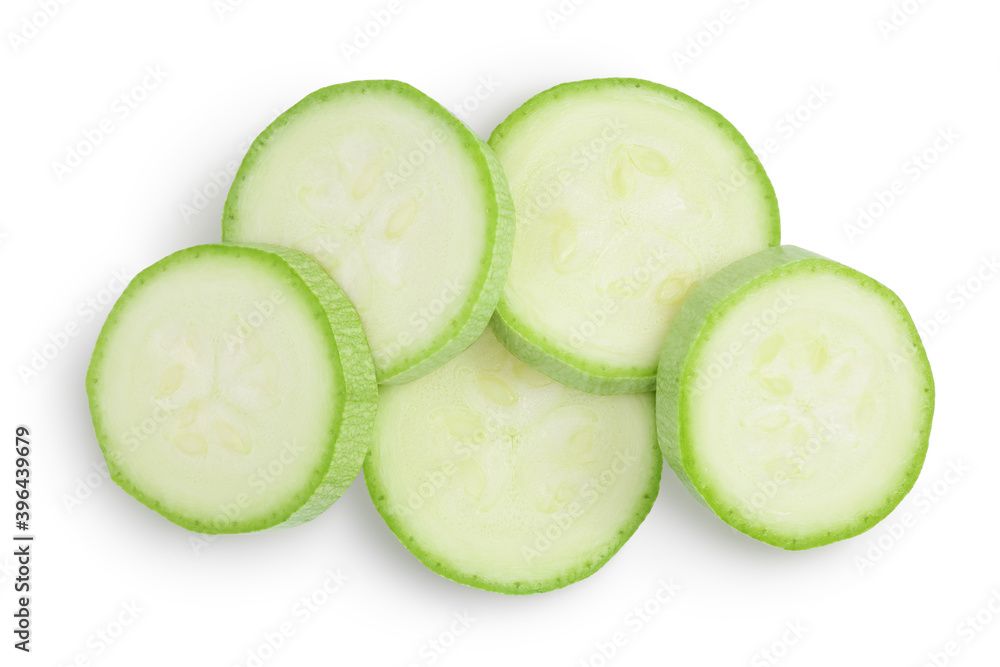 zucchini or marrow slices isolated on white background with clipping path and full depth of field. Top view. Flat lay zucchini or marrow slices isolated on white background with clipping path and full depth of field. Top view. Flat lay