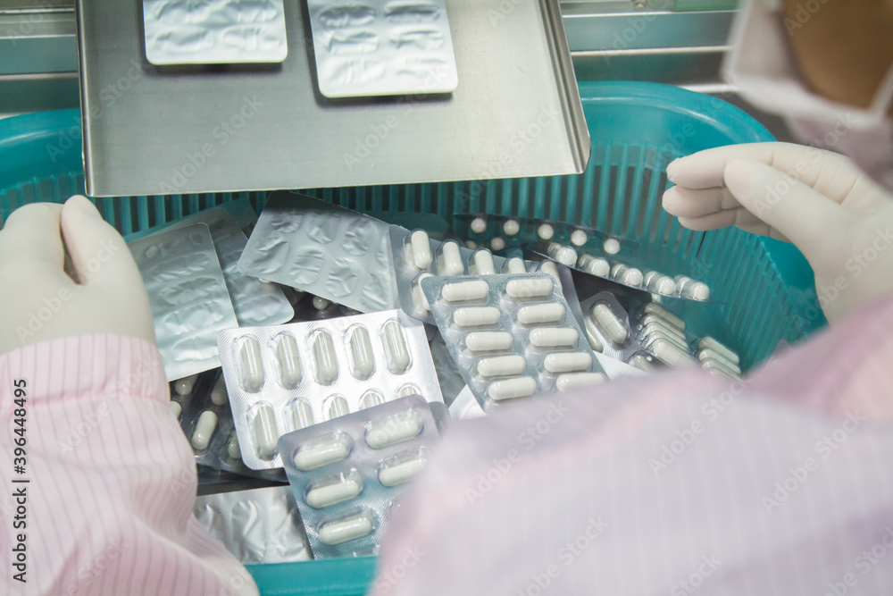 Capsule production process in factory. Capsule production process in factory.