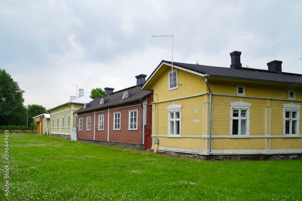 Obraz premium old houses and lawn