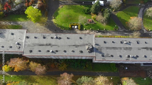 Wallpaper Mural Aerial dolly left over building roof on sunny day Torontodigital.ca