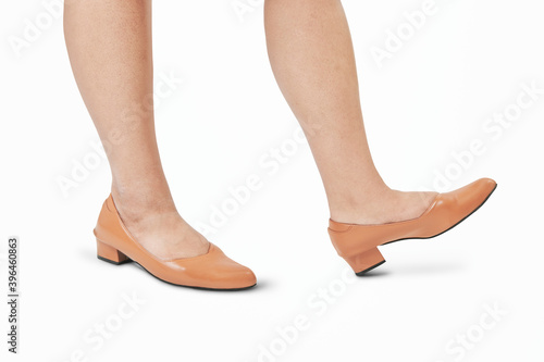Women&#39;s orange flat leather shoes mockup fashion shoot in studio