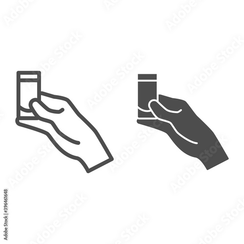 Glass of drink in hand line and solid icon, Bartenders Day concept, Male hand holding shot of alcohol drink sign on white background, drinking shots icon in outline style. Vector graphics.
