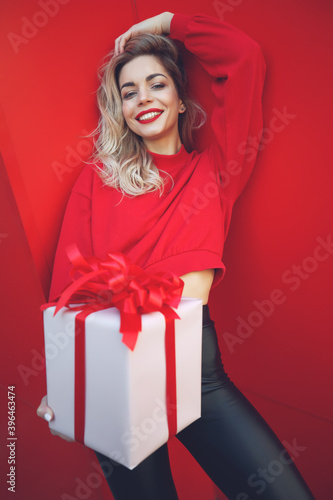 Beautiful young sexy woman slim figure evening makeup fashionable stylish clothes, brunette, gift boxes holiday birthday New Year Christmas Valentine's Day. High quality photo.