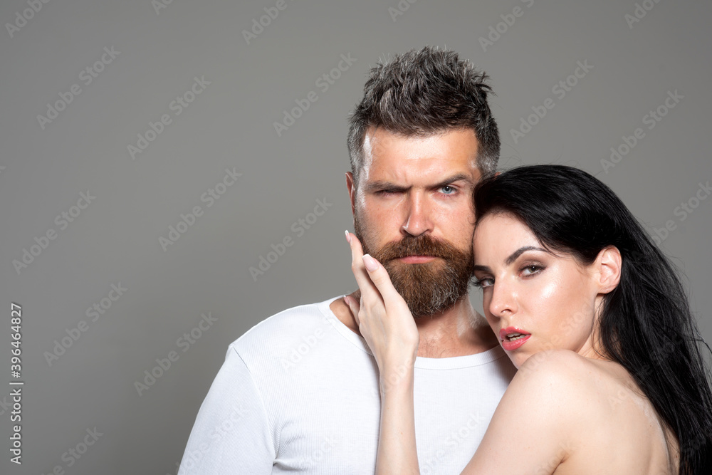 Fototapeta premium Sexy couple. Beautiful sexy lovers portrait. Model man with his girlfriend posing together. Passion. Boy and Girl in love. Love and dating. Family relationship.