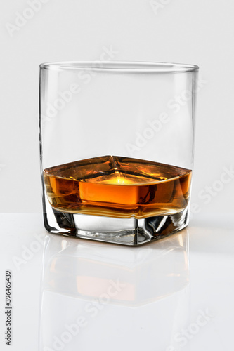 Obraz na plátně Whiskey served neat in a glass