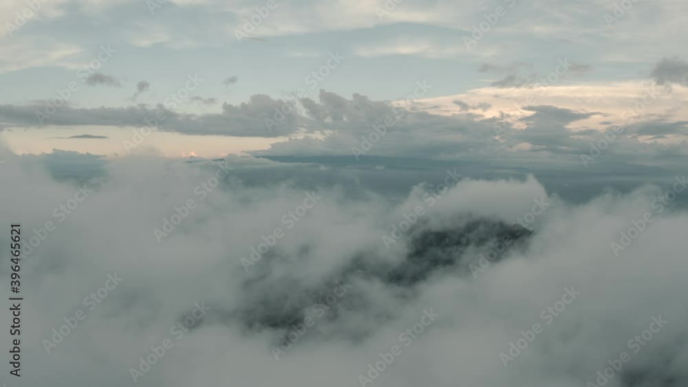 Drone aerial, beautiful misty cloudy landscape, over a cloud forest in Guatemala Drone aerial, beautiful misty cloudy landscape, over a cloud forest in Guatemala