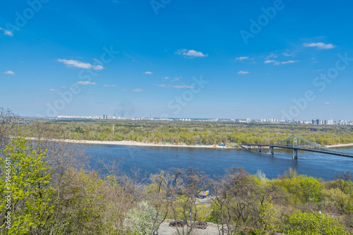 Landscape of riverbank and River of Dnieper against blue sky, view from the The Volodymyrska hill