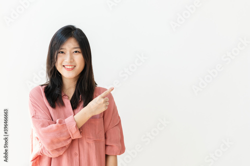 Fotografie Cheerful young woman with a design space