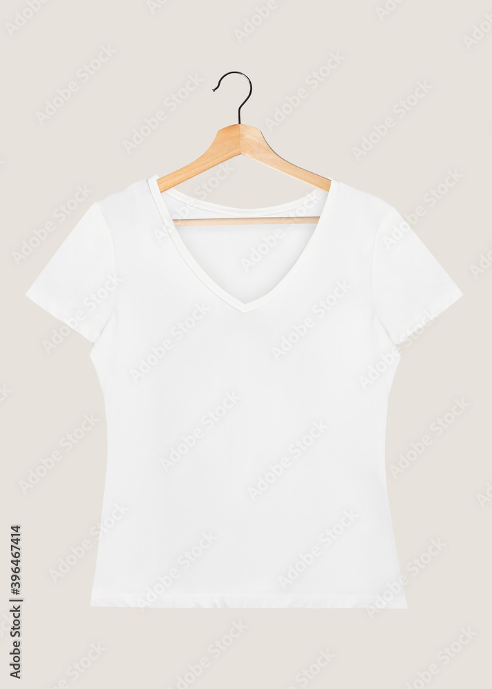 White t-shirt mockup on a wooden hanger White t-shirt mockup on a wooden hanger