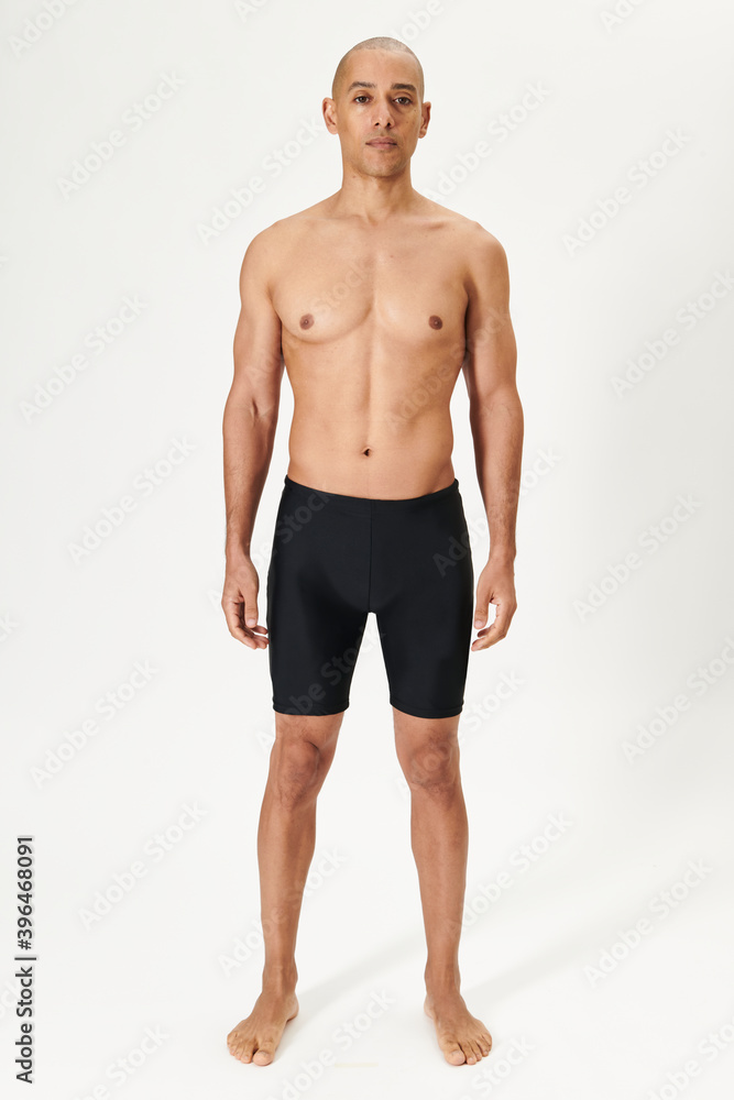 Man wearing black swimming jammers mockup Man wearing black swimming jammers mockup