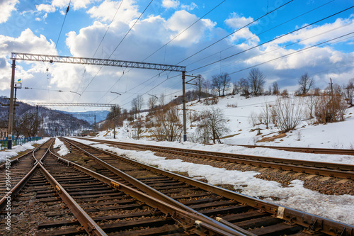 railway station in mountains. frosty winter landscape. transportation scenery