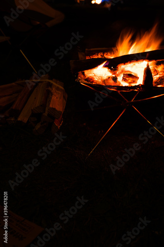 camping fire with camping gear