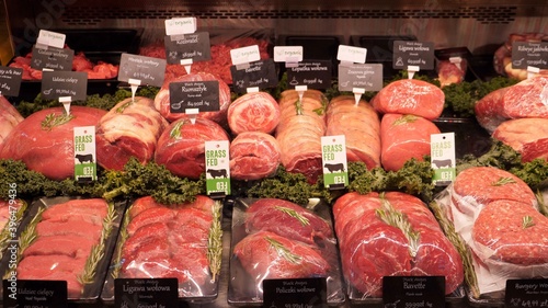 Display of assorted chopped raw red meat. Fresh organic meat department in supermarket