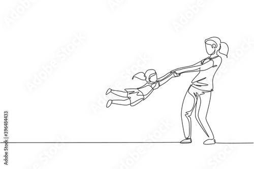 One single line drawing of young happy mom raising and turning her daughter around up in the air at home vector graphic illustration. Family parenthood concept. Modern continuous line draw design