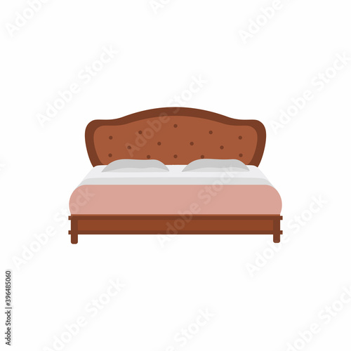 A bed with pillows in bedro...