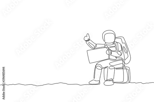 One single line drawing of astronaut hitchhiker siting on luggage while waiting for the ride in moon surface road vector illustration. Cosmonaut deep space concept. Modern continuous line draw design