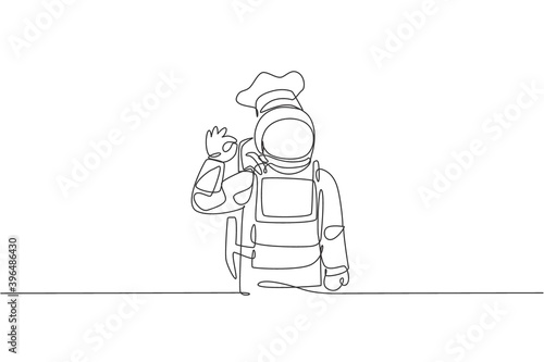 One single line drawing of young astronaut chef giving okay taste gesture for delicious food vector illustration. Delicious space galaxy dish concept. Modern continuous line draw design graphic