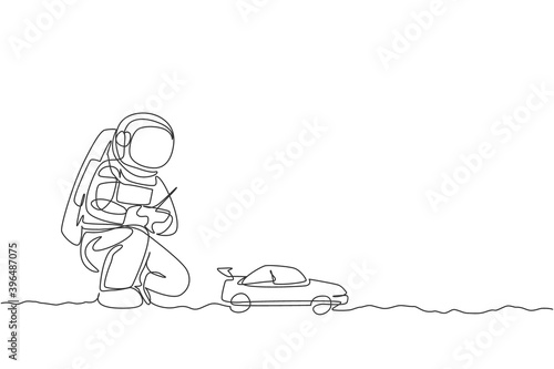 One single line drawing of astronaut playing race car radio control in moon land vector illustration graphic. Doing hobby while leisure time in deep space concept. Modern continuous line draw design