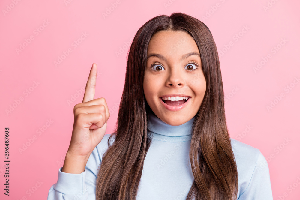 Close up photo of cheerful small person indicate finger up open mouth excelent isolated on pink color background Close up photo of cheerful small person indicate finger up open mouth excelent isolated on pink color background