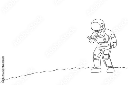 One single line drawing of cosmonaut  in moon surface make a call to family in earth with smartphone vector illustration. Astronaut business office with outerspace concept. Continuous line draw design