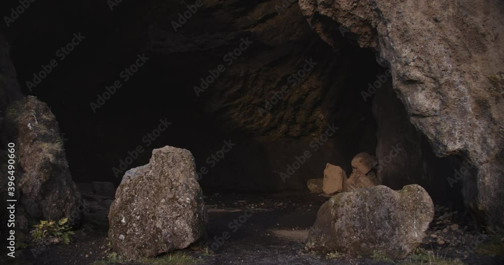 Entrance Of Rock Cave On Black Sand Beach
