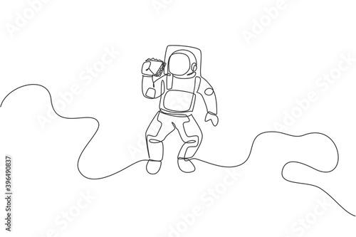 One single line drawing of astronaut flying in cosmos galaxy while eating fresh sandwich graphic vector illustration. Fantasy outer space life concept. Modern continuous line draw design