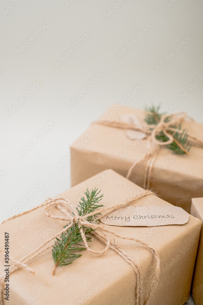 Christmas zero waste. Eco friendly packaging gifts in kraft paper.minimalism. place for text. top view Christmas zero waste. Eco friendly packaging gifts in kraft paper.minimalism. place for text. top view