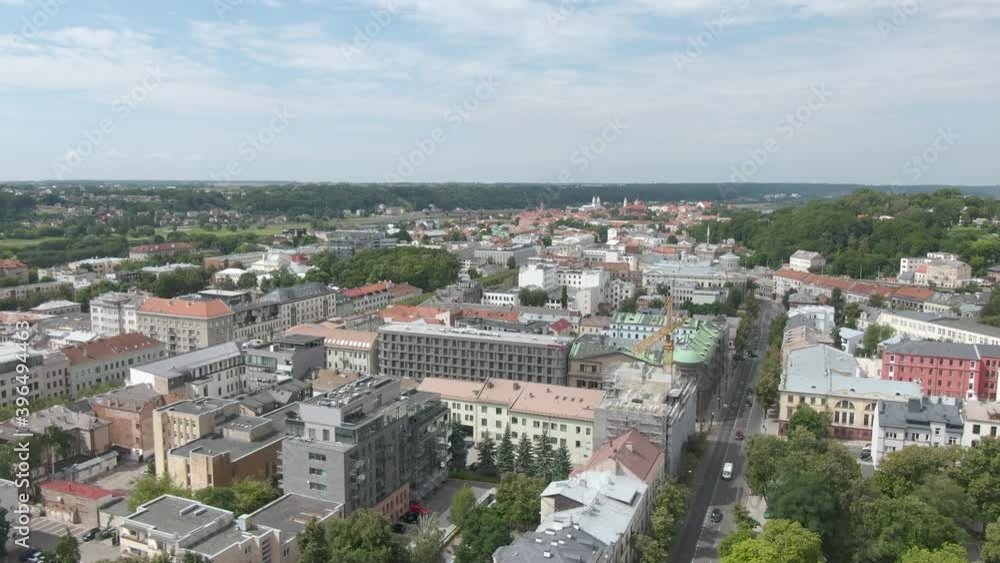 Aerial drone side view while descending and showing beautiful europe city. Aerial drone side view while descending and showing beautiful europe city.