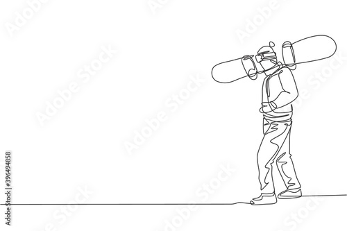 One single line drawing young energetic snowboarder man ride fast snowboard at snowy mountain graphic vector illustration. Tourist vacation lifestyle sport concept. Modern continuous line draw design