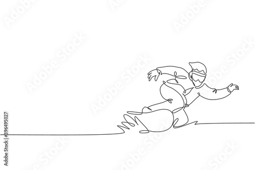 One single line drawing young energetic snowboarder man ride fast snowboard at snowy mountain vector illustration graphic. Tourist vacation lifestyle sport concept. Modern continuous line draw design