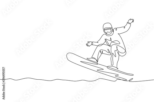 Single continuous line drawing young sportive snowboarder man riding snowboard fast at mountain. Outdoor extreme sport. Winter vacation concept. Trendy one line draw design graphic vector illustration