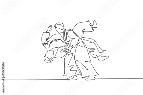 Single continuous line drawing of two young sportive man wearing kimono practice slamming in aikido fighting technique. Japanese martial art concept. Trendy one line draw design vector illustration