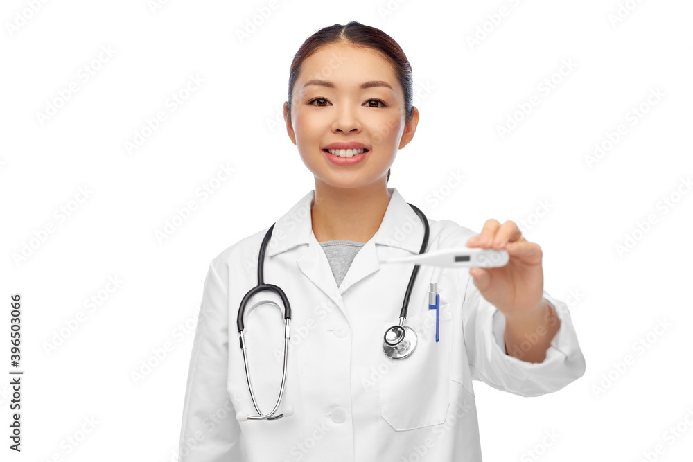 medicine, profession and healthcare concept - happy smiling asian female doctor with thermometer over white background medicine, profession and healthcare concept - happy smiling asian female doctor with thermometer over white background
