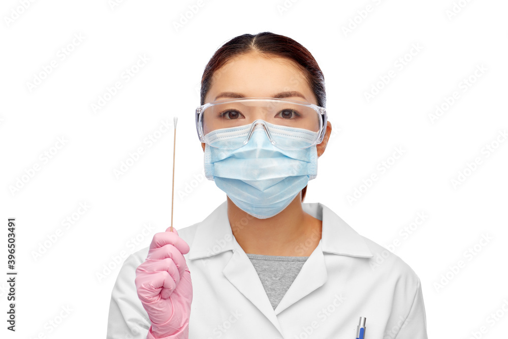 medicine, health and pandemic concept - young asian female doctor or scientist in medical mask and goggles holding test cotton swab medicine, health and pandemic concept - young asian female doctor or scientist in medical mask and goggles holding test cotton swab