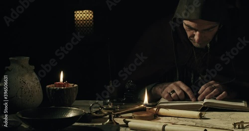 Ancient scribe reading and writing