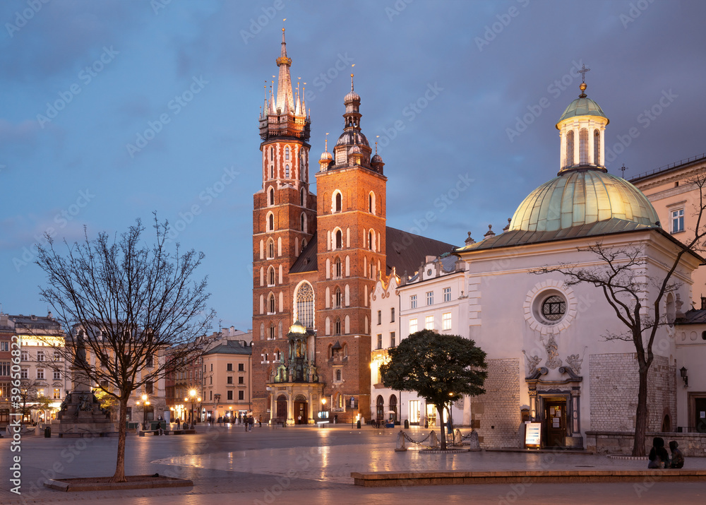 Krakow attractions in market square in the evening. Symbol of Krakow, Poland Europe.