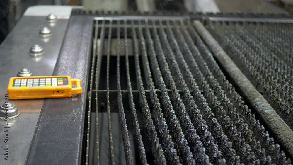Engineer hands take metal sheets cutted by CNC laser. Modern industrial technology Engineer hands take metal sheets cutted by CNC laser. Modern industrial technology