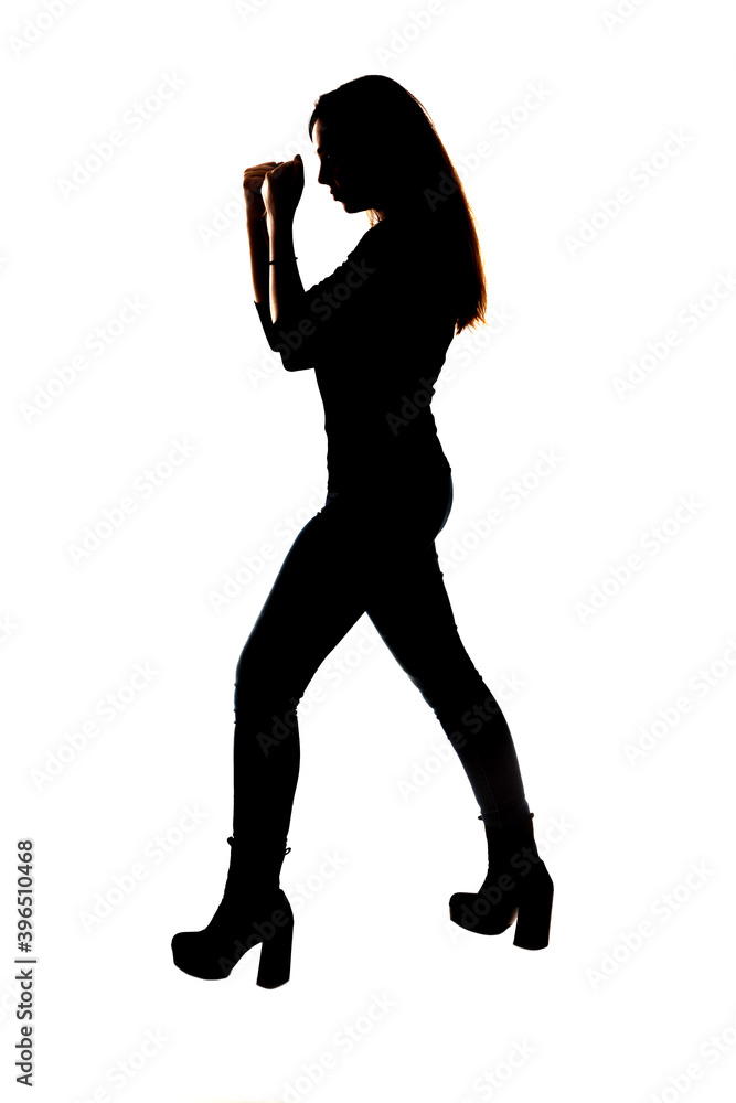 girl defending herself with clenched fists girl defending herself with clenched fists
