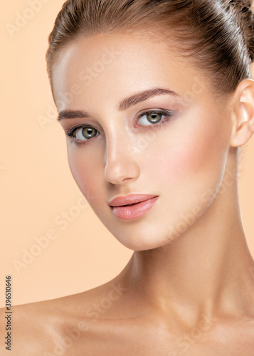 Beautiful face of young caucasian woman with perfect health fresh skin