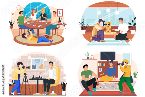 Photographer takes photos of people having good time together playing games sitting at the table at home or cafe. Happy people are resting, drinking coffee and playing a board game, jenga and chess