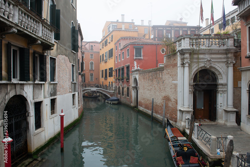 Picturesque view of ancient buildings and channel with gondolas in Venice, Italy. Beautiful romantic italian city. Unique Venetian landscape. © Khorzhevska